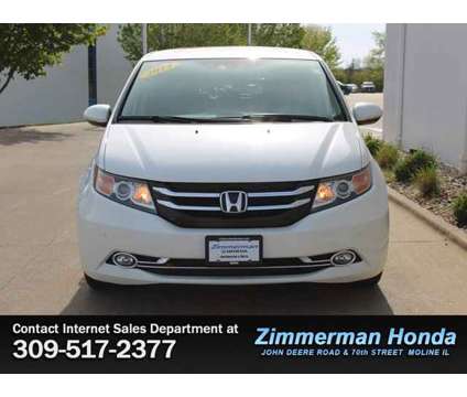 2014 Honda Odyssey Touring Elite is a White 2014 Honda Odyssey Touring Car for Sale in Moline IL