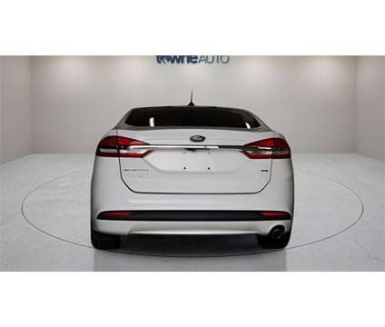 2018 Ford Fusion SE is a White 2018 Ford Fusion SE Sedan in Orchard Park NY