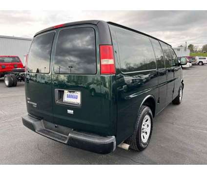 2011 Chevrolet Express 1500 Work Van Cargo is a Green 2011 Chevrolet Express 1500 Work Van Van in Freeport IL