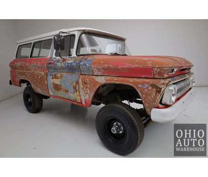 1963 Chevrolet Suburban 4x4 is a White 1963 Chevrolet Suburban 1500 Trim Classic Car in Canton OH