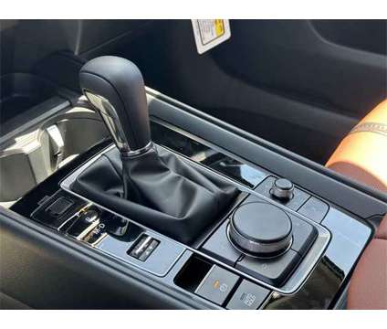 2024 Mazda CX-50 2.5 Turbo Premium Package is a Black 2024 Mazda CX-5 SUV in Chantilly VA