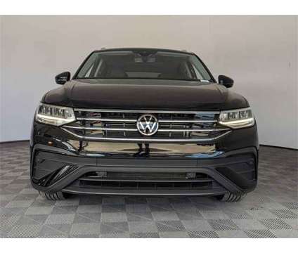 2023 Volkswagen Tiguan 2.0T SE is a Black 2023 Volkswagen Tiguan 2.0T S SUV in West Palm Beach FL