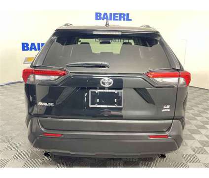 2021 Toyota RAV4 LE is a Black 2021 Toyota RAV4 LE SUV in Wexford PA