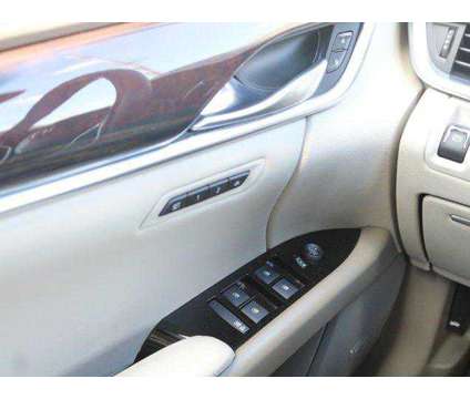 2014 Cadillac XTS Vsport Platinum is a White 2014 Cadillac XTS Vsport Platinum Sedan in Lansing MI