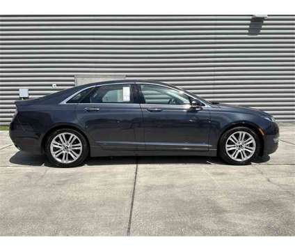 2014 Lincoln MKZ Hybrid is a White 2014 Lincoln MKZ Hybrid in Gainesville FL