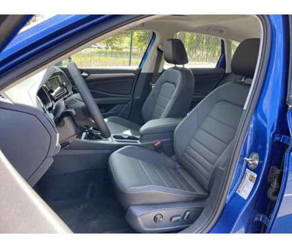 2024 Volkswagen Jetta SE is a Blue 2024 Volkswagen Jetta SE Sedan in Salisbury MD