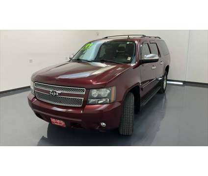 2009 Chevrolet Suburban LT2 is a Red 2009 Chevrolet Suburban 2500 Trim SUV in Waterloo IA
