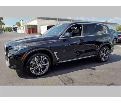 2025 BMW X5 xDrive40i is a Black 2025 BMW X5 4.8is SUV in Jacksonville FL