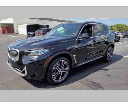 2025 BMW X5 xDrive40i is a Black 2025 BMW X5 4.8is SUV in Jacksonville FL