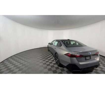 2024 BMW 5 Series i xDrive is a Grey 2024 BMW 5-Series Sedan in Freeport NY