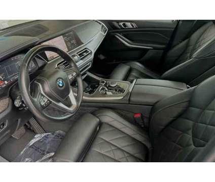 2023 BMW X5 sDrive40i is a Black 2023 BMW X5 3.0si SUV in Visalia CA