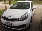 Kia Rio eco series EX. Only 5,600 miles