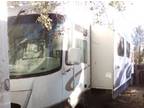 2002 Coachmen Aurora 35' with 7,300 Miles