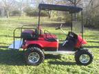 Liifted Georgia bulldog/falcons golf cart w/system