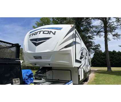 2018 Voltage by Dutchmen Triton FW Toy Hauler for sale is a White 2018 Car for Sale in Virginia Beach VA