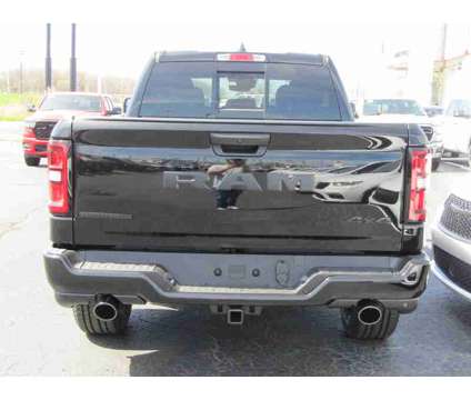 2025NewRamNew1500New4x4 Crew Cab 5 7 Box is a Black 2025 RAM 1500 Model Car for Sale in Brunswick OH