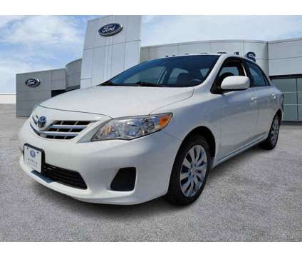 2013 Toyota Corolla is a White 2013 Toyota Corolla LE Car for Sale in Dundalk MD