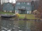 Beautiful full size lakefront Swan Lake 4 bed home