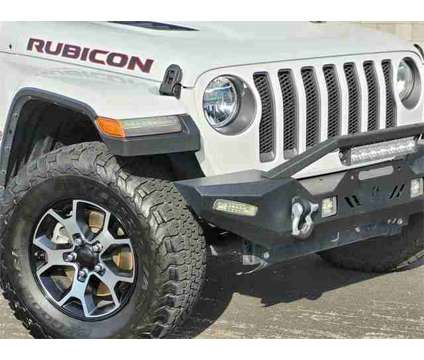 2021 Jeep Wrangler Unlimited Rubicon is a White 2021 Jeep Wrangler Unlimited Rubicon SUV in Selma CA