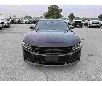 2021 Dodge Charger SXT is a Black 2021 Dodge Charger SXT Sedan in Fort Smith AR