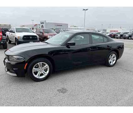 2021 Dodge Charger SXT is a Black 2021 Dodge Charger SXT Sedan in Fort Smith AR