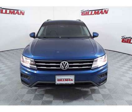 2020 Volkswagen Tiguan 2.0T SE is a Blue 2020 Volkswagen Tiguan 2.0T S SUV in Houston TX