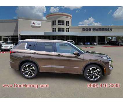 2024 Mitsubishi Outlander SEL is a Tan 2024 Mitsubishi Outlander SEL SUV in Plano TX