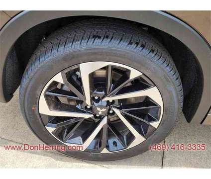 2024 Mitsubishi Outlander SEL is a Tan 2024 Mitsubishi Outlander SEL SUV in Plano TX