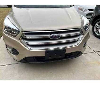 2017 Ford Escape for sale is a Gold 2017 Ford Escape Car for Sale in Powder Springs GA