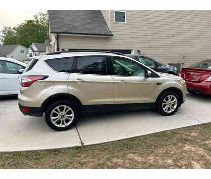 2017 Ford Escape for sale is a Gold 2017 Ford Escape Car for Sale in Powder Springs GA