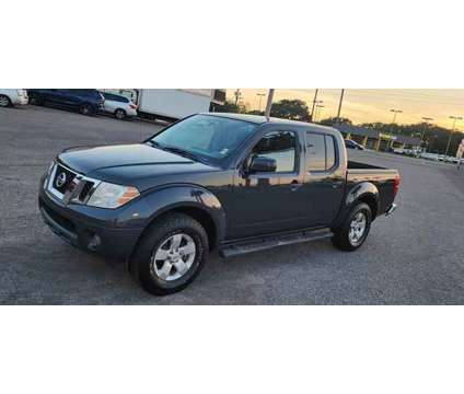 2012 Nissan Frontier Crew Cab for sale is a Grey 2012 Nissan frontier Car for Sale in Tampa FL