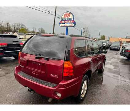 2008 GMC Envoy for sale is a Red 2008 GMC Envoy Car for Sale in Redford MI