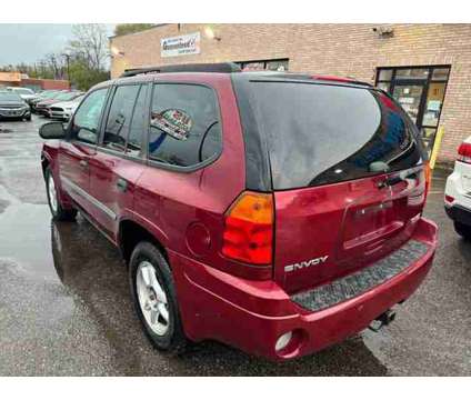 2008 GMC Envoy for sale is a Red 2008 GMC Envoy Car for Sale in Redford MI