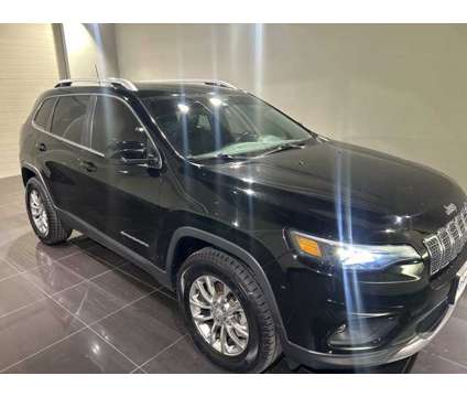 2021 Jeep Cherokee Latitude Lux is a Black 2021 Jeep Cherokee Latitude Car for Sale in Madison WI