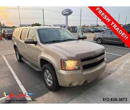 2007 Chevrolet Suburban Lt is a Gold 2007 Chevrolet Suburban LT Car for Sale in Georgetown TX