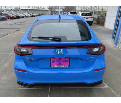 2024 Honda Civic Hatchback Sport is a Blue 2024 Honda Civic Hatchback in Omaha NE