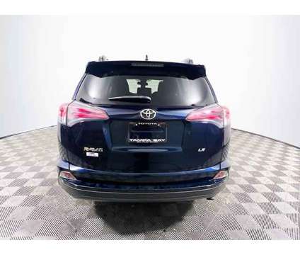 2018 Toyota RAV4 LE is a Blue 2018 Toyota RAV4 LE Car for Sale in Tampa FL