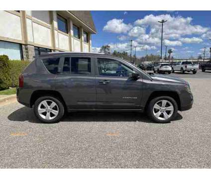 2016 Jeep Compass Latitude is a Grey 2016 Jeep Compass Car for Sale in Traverse City MI