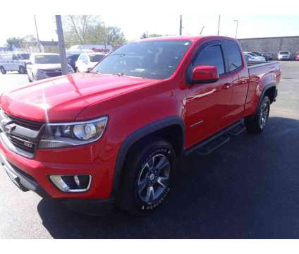 2015UsedChevroletUsedColoradoUsedExt Cab 128.3 is a Red 2015 Chevrolet Colorado Car for Sale in Hamilton OH