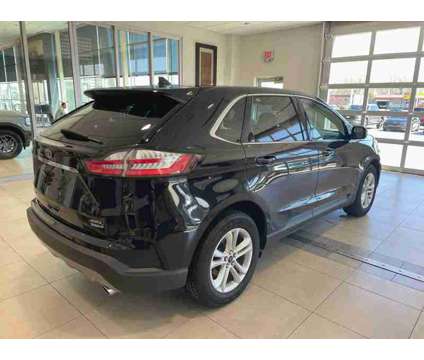 2020UsedFordUsedEdgeUsedAWD is a Black 2020 Ford Edge Car for Sale in Milwaukee WI