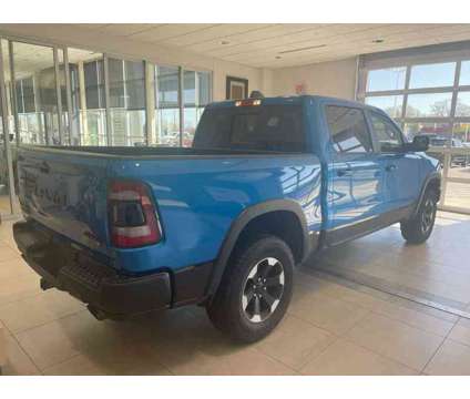2022UsedRamUsed1500Used4x4 Crew Cab 57 Box is a Blue 2022 RAM 1500 Model Car for Sale in Milwaukee WI