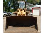 Wheel loader Caterpillar 938G Year 2000