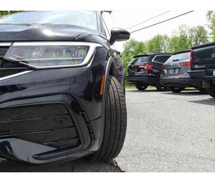 2024 Volkswagen Tiguan 2.0T SE R-Line Black is a Black 2024 Volkswagen Tiguan 2.0T SUV in Queensbury NY
