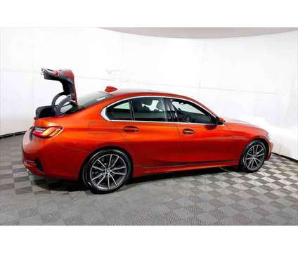 2021 BMW 3 Series xDrive is a Orange 2021 BMW 3-Series Sedan in Freeport NY