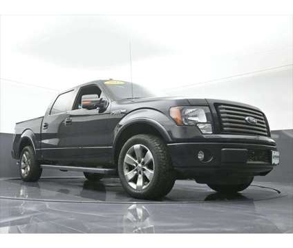 2012 Ford F-150 FX2 is a Black 2012 Ford F-150 FX2 Truck in Dubuque IA