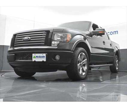 2012 Ford F-150 FX2 is a Black 2012 Ford F-150 FX2 Truck in Dubuque IA