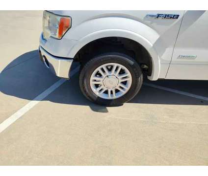2013 Ford F-150 XLT is a Silver, White 2013 Ford F-150 XLT Truck in Ardmore OK