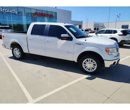 2013 Ford F-150 XLT is a Silver, White 2013 Ford F-150 XLT Truck in Ardmore OK
