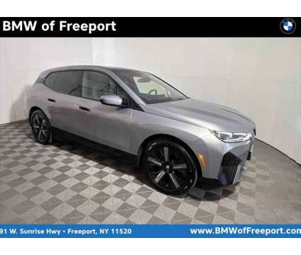 2023 BMW iX M60 is a Grey 2023 BMW 325 Model iX SUV in Freeport NY
