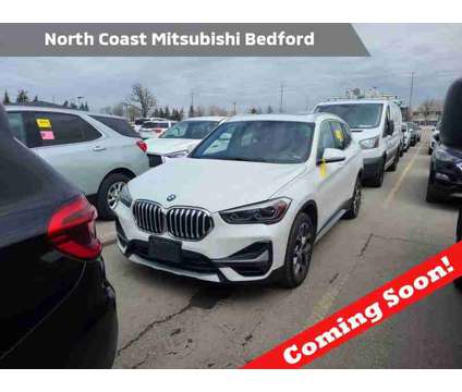 2021 BMW X1 xDrive28i is a White 2021 BMW X1 xDrive 28i SUV in Bedford OH